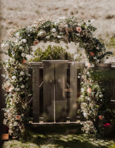 Oregon beach wedding flowers archway