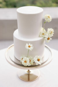 cake decorated with daisies
