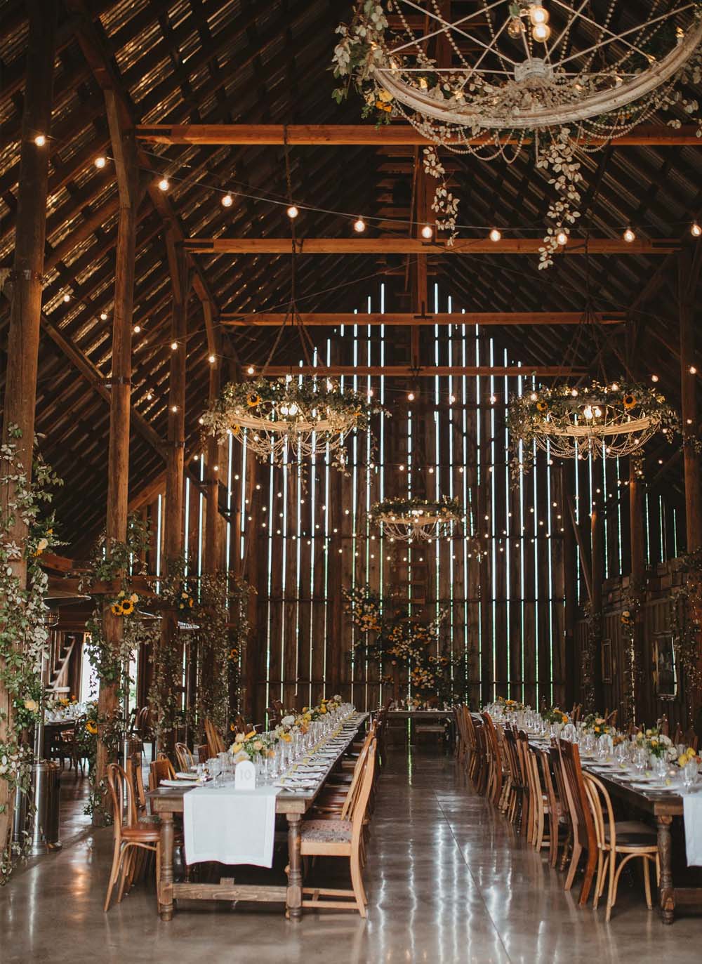stunning barn wedding interior flowers