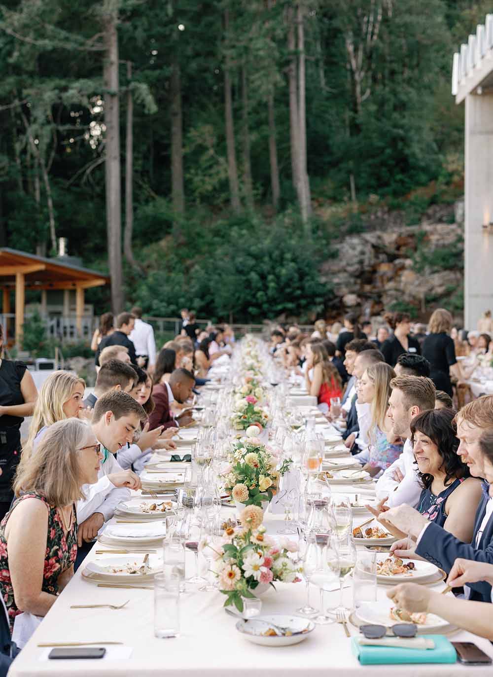 winery wedding banquet table with people eating